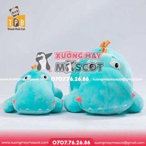 Gấu bông khủng long nằm mắt lòi